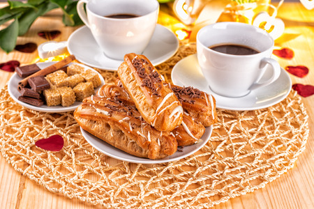 Eclairs with sugar slices for a festive Breakfastの写真素材