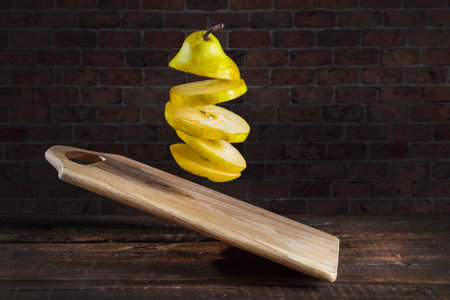 Fruits flying in the air against the background of the wall.の写真素材