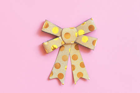 Ribbon bow on paper background for design and decor.の写真素材