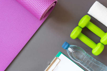 Dumbbells on background. The concept of a healthy lifestyle.