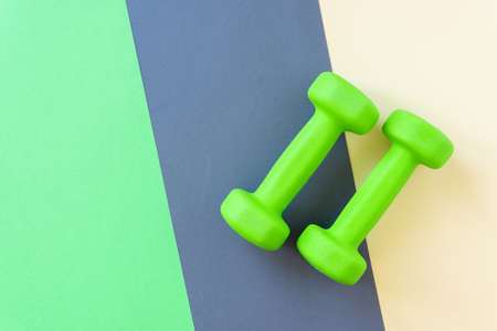 Dumbbells on a background. The concept of a healthy lifestyle.の写真素材