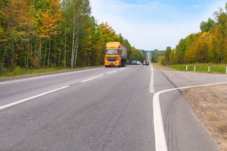 Cars on the way, traffic on the roads of the country.の写真素材