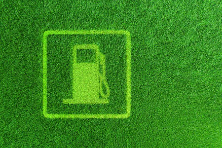 A gas station sign on the green grass. 3d render.の写真素材