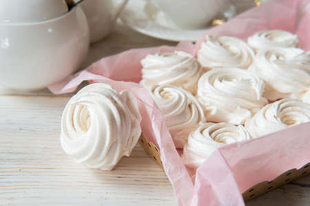 Traditional marshmallows on a plate on the kitchen tableの写真素材