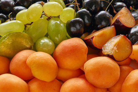 Delicious, fresh and colorful mixed  fruit ready to be eatenの写真素材