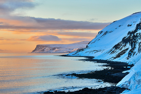 Beautiful seascape in Iceland. Winter sunrise with beautiful lights.の写真素材