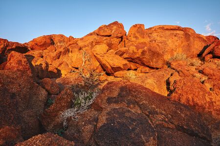 Namibian big red rocks in thre desert.の写真素材