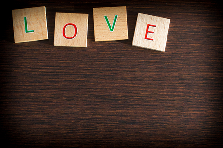 Wooden Tiles with LOVE textの写真素材
