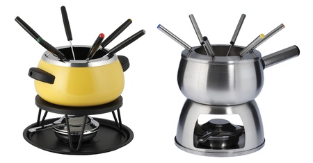 two fondue sets in different colors. One yellow and one chromeの写真素材