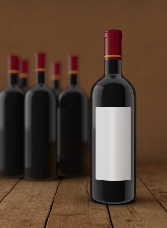 some bottles of red wine. One bottle with a white label for custom text or image (3d render)の写真素材