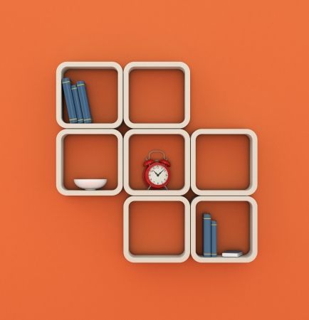 one modern bookshelf on an orange wall (3d render)の写真素材