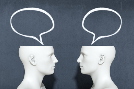 two heads with speech bubbles, concept of dialogue (3d render)の写真素材