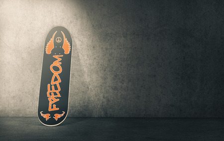 a skateboard leaning against wall, empty space at the right for custom text (3d render)の写真素材