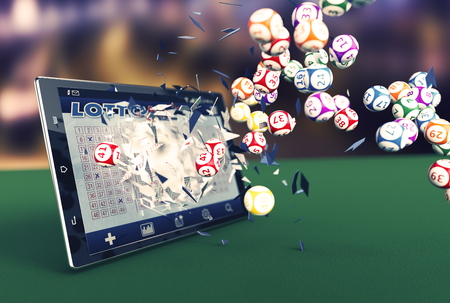 tablet pc with a lottery app and lottery balls coming out by breaking the glass (3d render)の写真素材