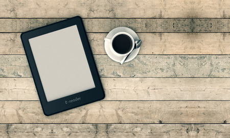 top view of an ebook reader with a cup of coffee, wooden background (3d render)の写真素材