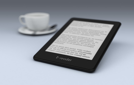ebook reader with a cup of coffee on background, text is the Lorem Ipsum (3d render)の写真素材