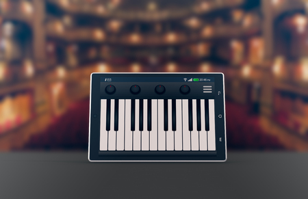one tablet pc with a piano app on a theater stage, concept of music and technology (3d render)の写真素材