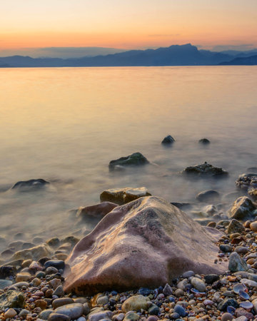 Lago di Garda in Italy at sunsetの写真素材