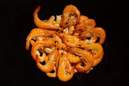 composition of prawns on black backgroundの写真素材