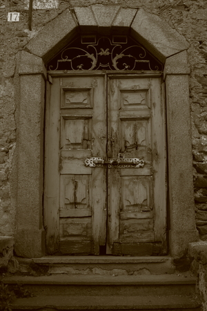old, sinister and spooky door with 17 numberの写真素材