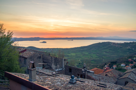 Lake Bolsena sunset from the roofs of Montefiascone village Lazio - Italy - Viterboの写真素材