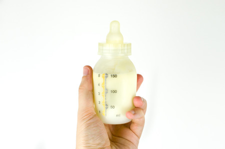 hand breast milk bottleの写真素材