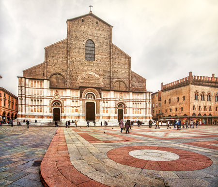 Bologna, Italy - December 6, 2014: San Petronio basilica facade  and  Crescentone flooring of Piazza Maggioreのeditorial素材