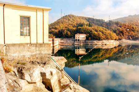 hydroelectric power plant dam basin autumnのeditorial素材