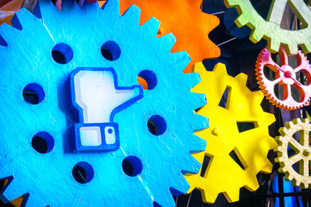 Cento, Italy, 19 feb 2017:  Facebook like symbol on a big gear. Facebook is a famous worldwide web social networkのeditorial素材