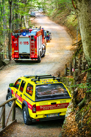 Modena, Italy, 27 Aug 2017:  Mountain rescue car (italian Soccorso Alpino vehicle ) and fire truckのeditorial素材