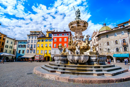 Trento, Italy, 14 Aug 2017 - Fontana del Nettuno (Neptune fountain) in Piazza Duomo in Trento during a cultural trip to Italyのeditorial素材
