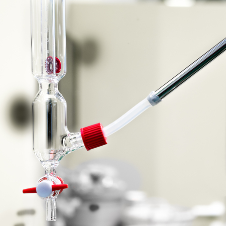 alchemical distiller closeup glass transparent spout doser measure drip alchemyの写真素材