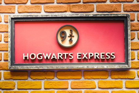 sign of the famous  9 and three quarter platform of the Hogwarts Express train  from the Harry Potter saga - Ferrara, Oct 15 2017のeditorial素材