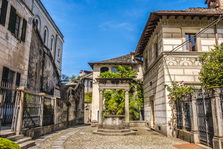 Orta San Giulio court alley water well village pump Piedmont Novara Italyの写真素材