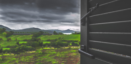 gloomy day stormy sky look through window stay home rainy days wet season blurred backgroundの写真素材