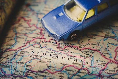 Slovakia map blue toy car background travel conceptのeditorial素材