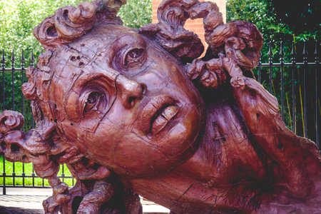 red Statue face at the art museum of the Masone Labyrinth in Fontanellato - Parma - province - italyのeditorial素材