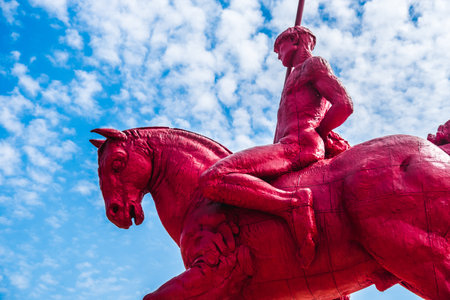 red knight and horse with sky background at the Masone Labyrinth Museum in Fontanellato - Parma - Italyのeditorial素材