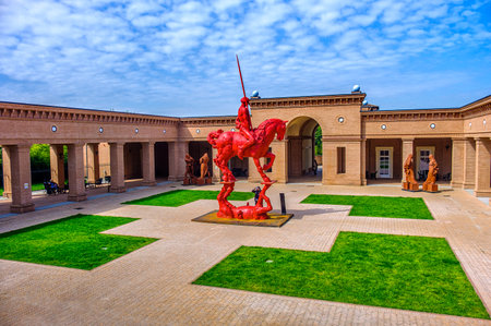red knight and horse with plaza background at the Masone Labyrinth Museum in Fontanellato - Parma - Italyのeditorial素材