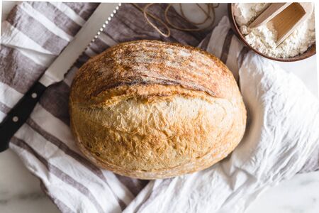 freshly baked homemade artisan sourdough breadの写真素材