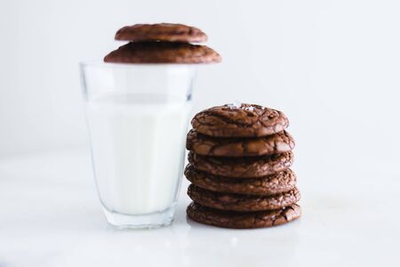 chocolate brownie cookie with glass of milk.の写真素材