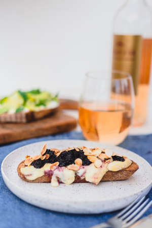 Blackberries and brie cheese crostini (bruschetta).の写真素材