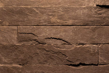 Dark brown tiles as background, textureの写真素材