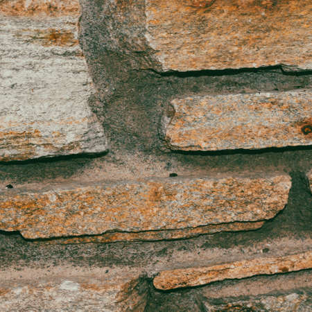 rustic and aged wallstone, exterior wallの写真素材