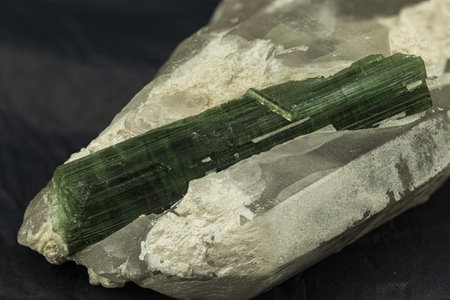 Reddish Tourmaline stone on matrix against Black Backgroundの写真素材