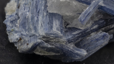mineral sample of kyanite on a black backgroundの写真素材