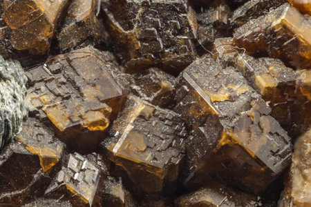 mineral specimen of garnet with the crystals in the foregroundの写真素材