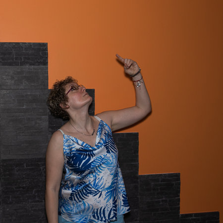 Bold & Curious at 40: Curly blonde, glasses, exploring new horizons with optimismの写真素材