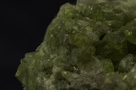 Explore the beauty of natural minerals with this vivid green crystal cluster, showcasing a textured surface and rich coloration. Perfect for collections and educational usesの写真素材