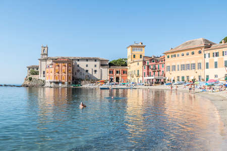 Sestri Levante, Italy - 07/02/2020: the beach of Silence with many colored housesの写真素材